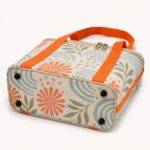 bottom base view of original coastal print insulated lunch tote bag showing soft structured base and stitched piping