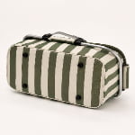 bottom view of striped insulated cooler basket showing black feet and stitched piping