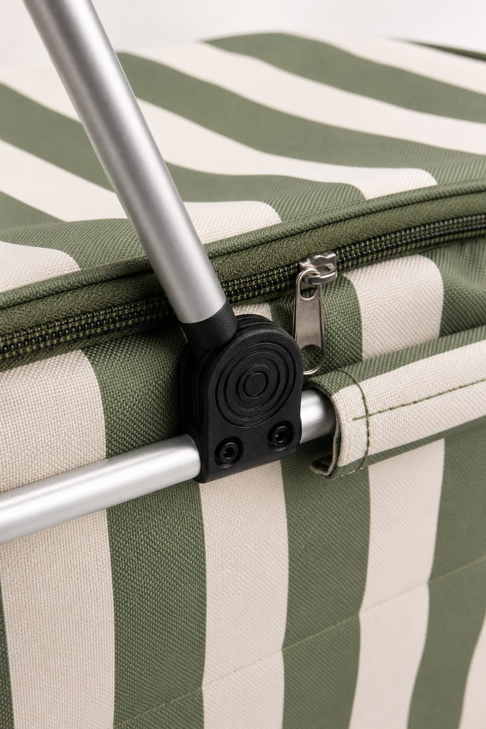 close up of cooler basket zipper aluminum handle black hinge and woven striped fabric texture