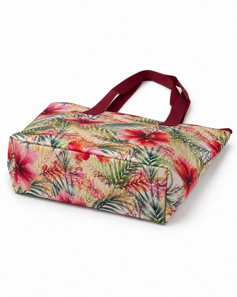 bottom base view of tropical floral tote bag showing folded corners and soft structured base