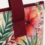 close up of burgundy webbing handle zipper pull stitching and tropical floral printed fabric