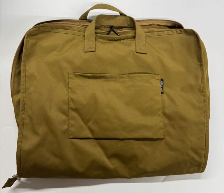 Mustard travel bag sample with top zipper handles and front pocket