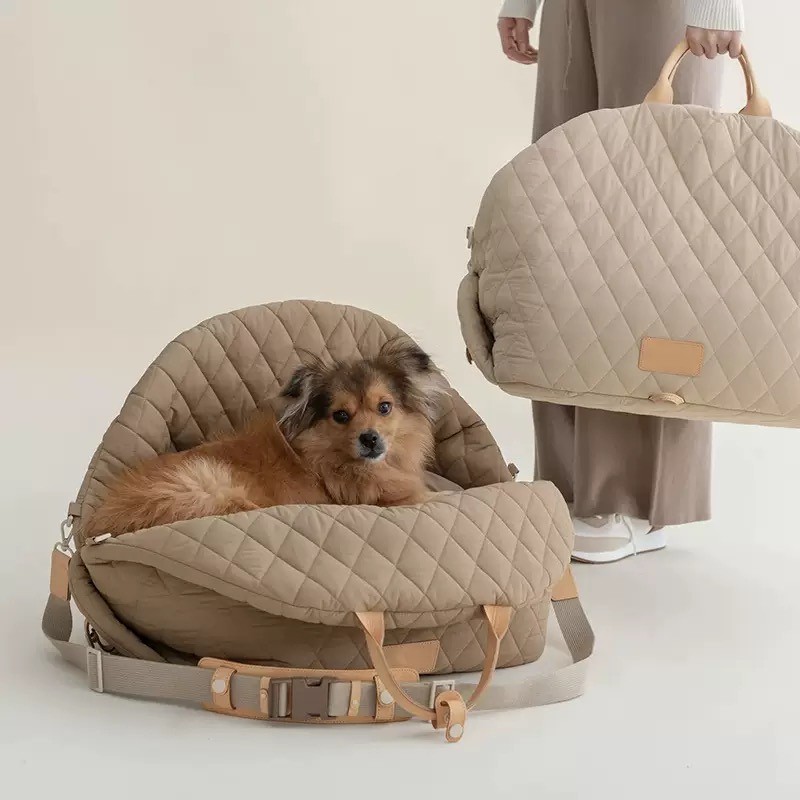 quilted pet car seat carrier in carry and open resting configurations